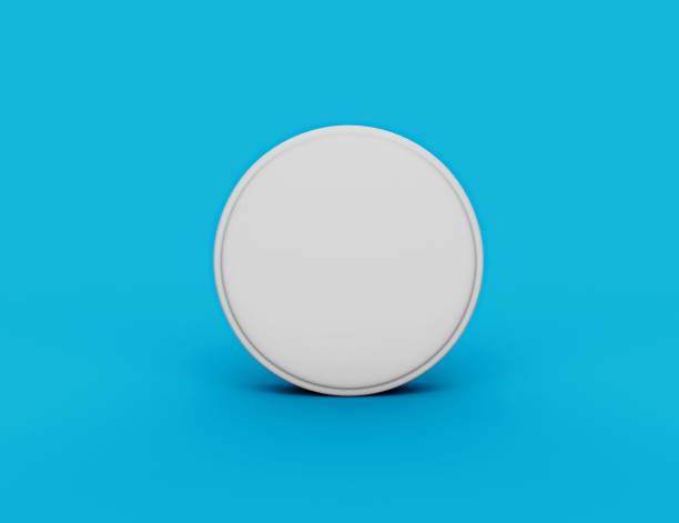 istock 3d illustration Realistic white medicine pill or tablet isolated standing on blue background 1443465701