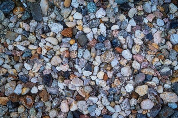 istock Top view of colorful stone pebbles 1443465729