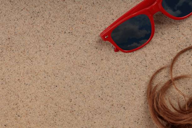Minimal mockup background for product presentation on a sandy beach. View from above