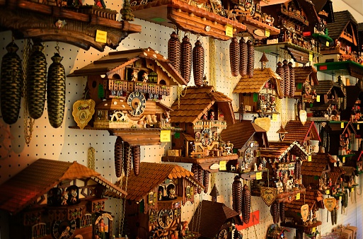 An array of cuckoo clocks in a shop in Interlaken Switzerland