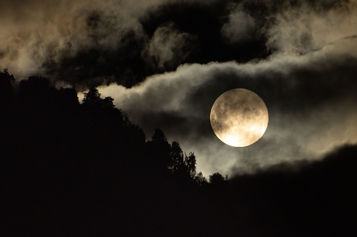 A beautiful full moon on a misty night