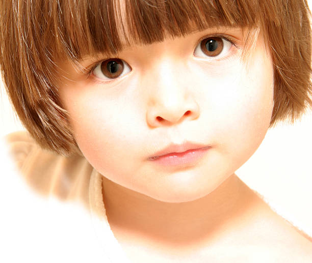 Young child with attentive look stock photo