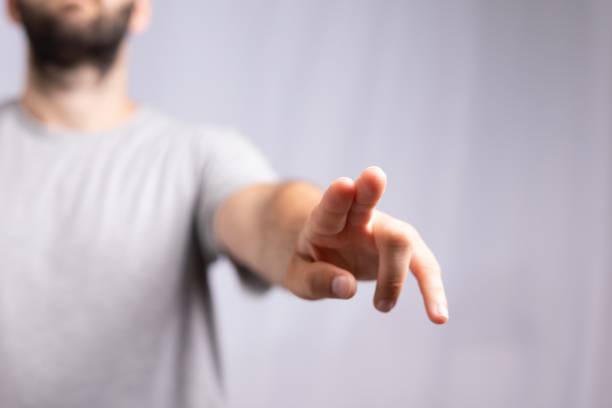 istock Human hand pointing to the front, can be used for presenting 3d renderings 1443472564