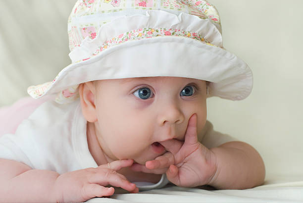 Little girl in hat stock photo
