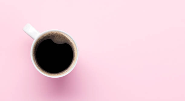istock Espresso coffee on pink background 1443474091