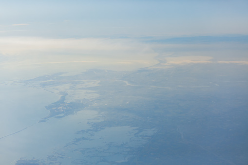 Aerial View of Earth . Flying over coastal land