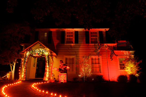 San Jose, California - October 26, 2022: House decorated for Halloween with Large Jack in a Box and Orange Lights
