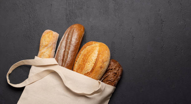 istock Fresh baked bread in bag 1443475104