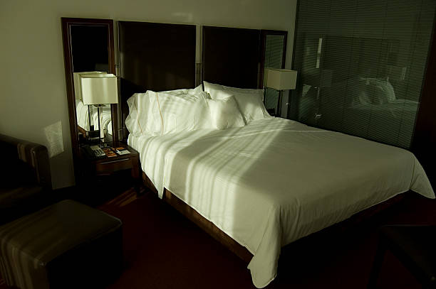 istock Bed in luxury bedroom hotel 144347654