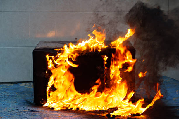 istock microwave oven on fire. the concept of fire in the kitchen. 1443477032