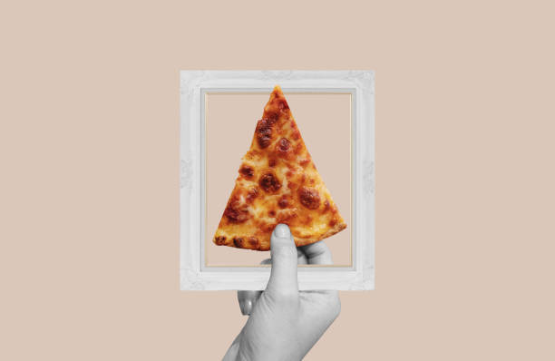 istock Digital collage, Hand holding slice of pizza, with picture frame 1443478077