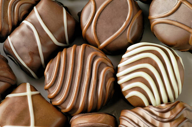 istock Chocolate candies closeup 144347999