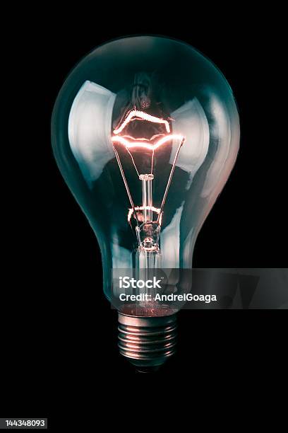 Light Bulb Stock Photo - Download Image Now - Black Color, Bright, Brightly Lit