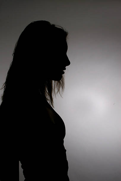 istock Silhouette woman profile 144348262