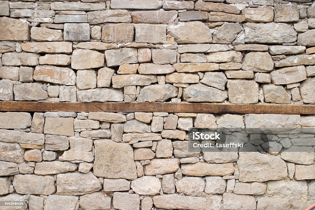 Muro de pedra - Foto de stock de Pedra - Material de Construção royalty-free