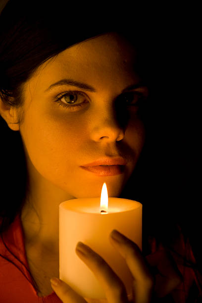 istock Beautiful woman bathed in soft candle light 144348477