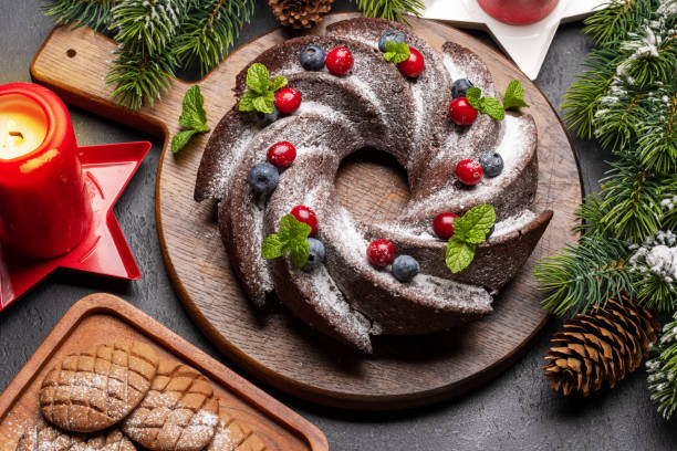 istock Christmas cake with blueberries, cranberries and mint 1443488944