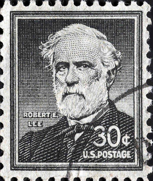 Robert E. Lee Portrait of the Confederate General on a US postage stamp.  He didn't look too happy in this picture, which is perhaps a reasonable compromise when honoring a rebel. the general lee stock pictures, royalty-free photos & images