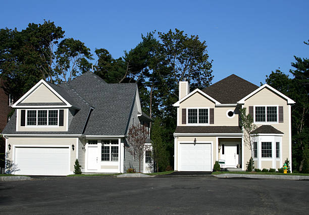istock two single family house neighbor side by 144349046