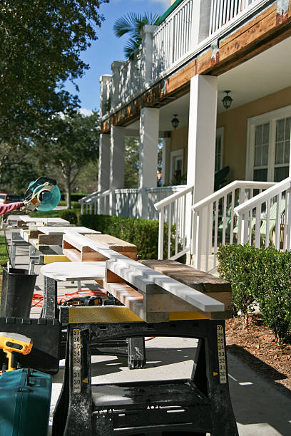 Residential Repairs tools set up on sidewalk in front of condo building under repair sawhorse stock pictures, royalty-free photos & images