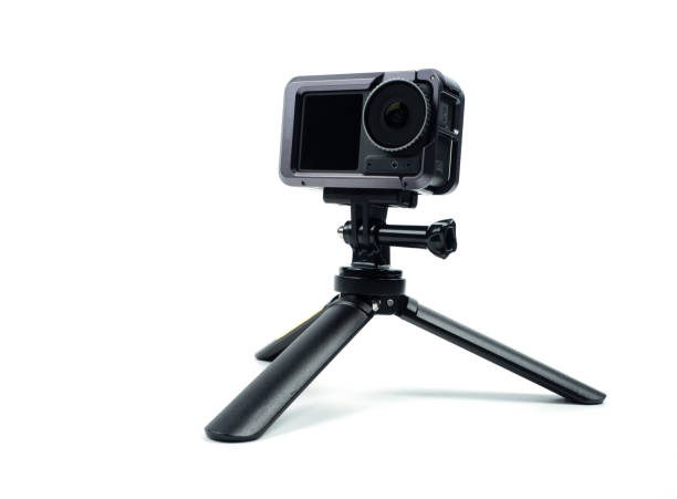 istock 4K action camera with tripod on white background 1443491880