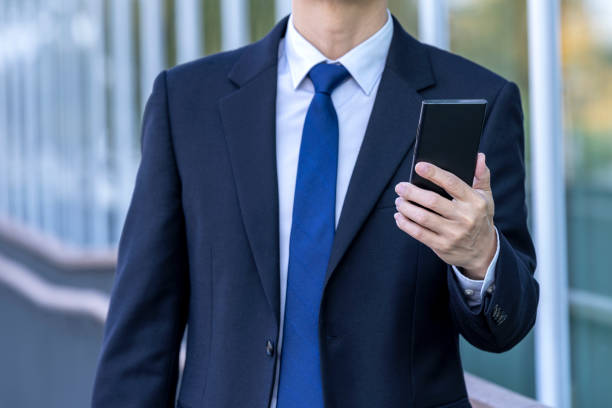 istock Asian Business Men's Work Style with Mobile Phone 1443493541