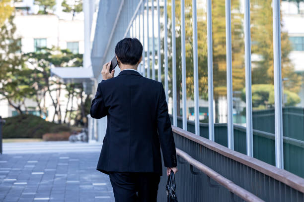 istock Asian Business Men's Work Style with Mobile Phone 1443493571