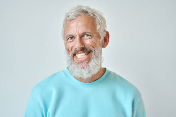istock Smiling old bearded man isolated on white background, headshot portrait. 1443495724