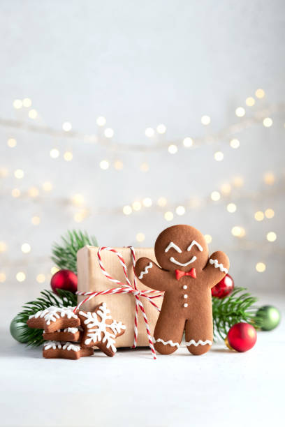 Cute Gingerbread man Cute Gingerbread man for Christmas card. Cozy concept of Christmas and winter holidays. Top view. gingerbread man stock pictures, royalty-free photos & images