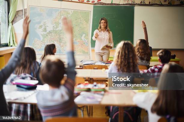 Who Is Going To Answer My Question Stock Photo - Download Image Now - Teacher, Classroom, Education