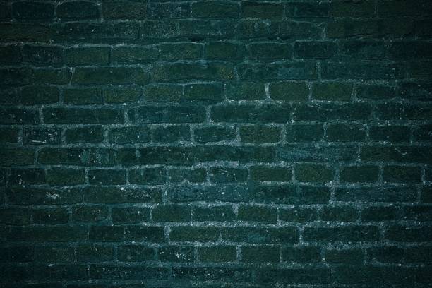 istock Old Grunge Brick Wall Texture Background in Dark Tone. 1443497662