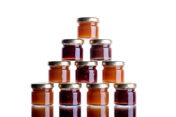 istock a lot of banos with jam on a white isolated background with reflection 1443498430