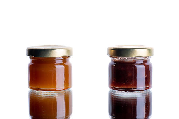 istock a lot of banos with jam on a white isolated background with reflection 1443498440