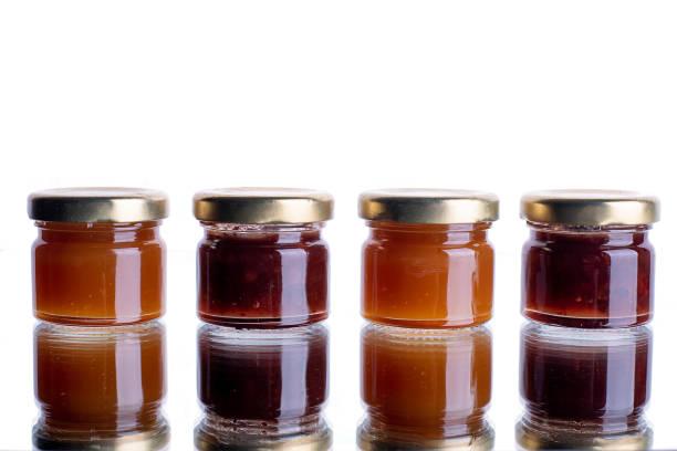istock a lot of banos with jam on a white isolated background with reflection 1443498443