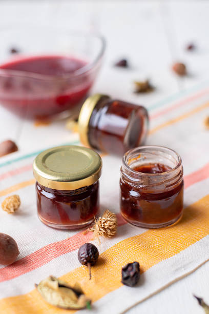 istock raspberry jam on the table. a jar of red marmalade on a light-colored fabric 1443499070