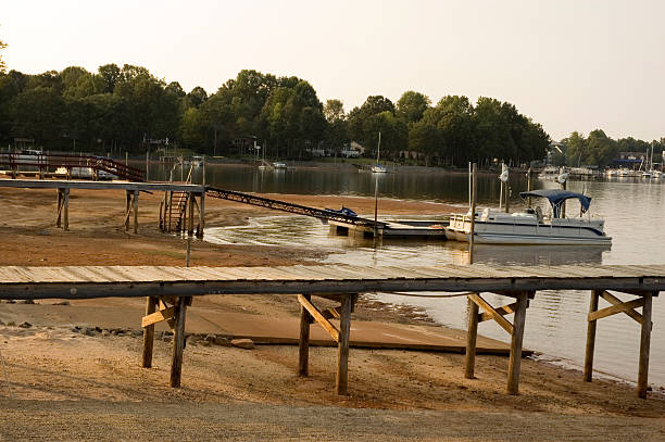 The water has receded past the boat ramps, leaving both docks and boats almost out of water on Lake Norman, North Carolina during September 2007.