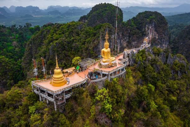 Aerial view of Wat Tham Suea or Tiger Cave Temple in Krabi, Thailand Aerial view of Wat Tham Suea or Tiger Cave Temple in Krabi, Thailand, south east asia wat tham sua stock pictures, royalty-free photos & images