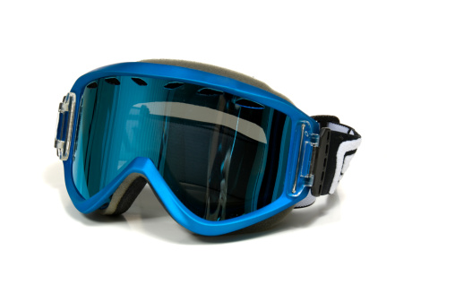 Blue ski goggles on white background