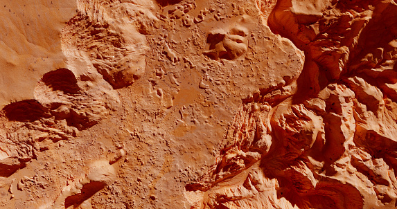 3D rendered prints on a planet surface or meteorite. Mars crater for a creative design. Space connected backgrounds