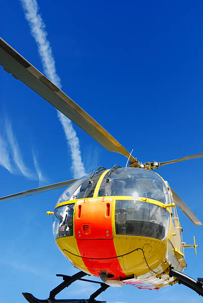 istock orange and yellow colored rescue helicopter vertical 144350620