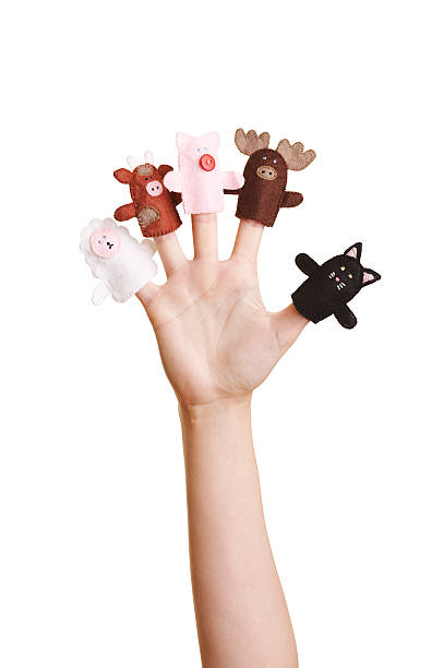 istock Outstretched hand with finger puppets on each finger 144350640