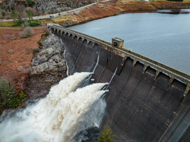 istock Hydroelectric Power Station Pumping Water Through a Dam 1443512994