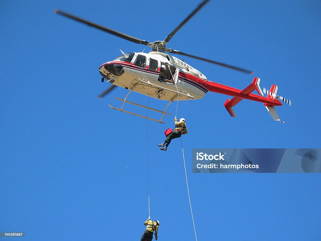 reminder fire fighters Rappelling Stock Photo