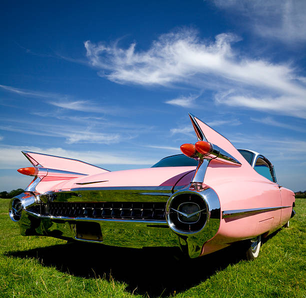 Pink Tail The classic pink 1959 Cadillac Coupe de Ville with her tail up.  1950 1959 stock pictures, royalty-free photos & images