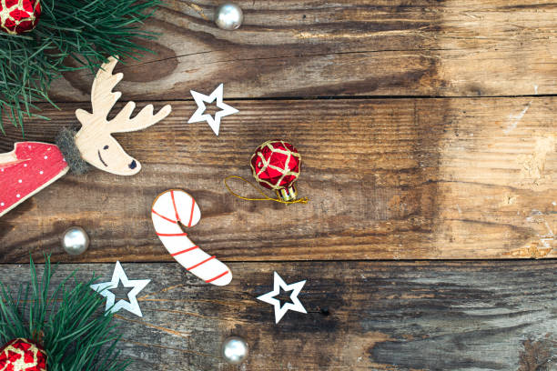 istock Wooden Christmas background with decor details, flat lay. 1443517256