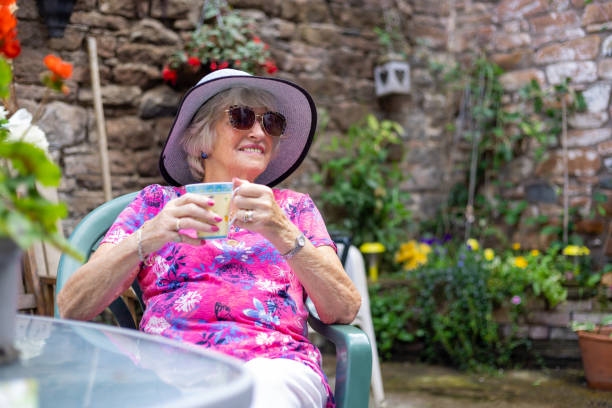 istock Relaxing in The Sun with a Cup of Tea 1443517300