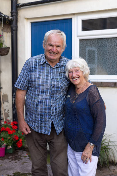 istock Senior Couple Looking Into The Camera 1443517461