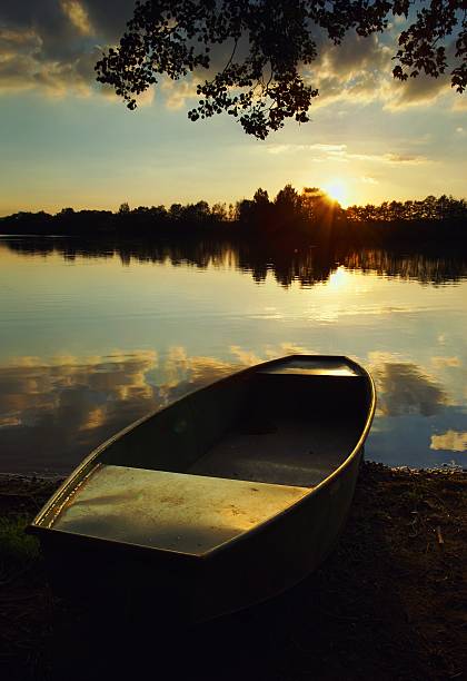 Lake at Sunset with a Boat
