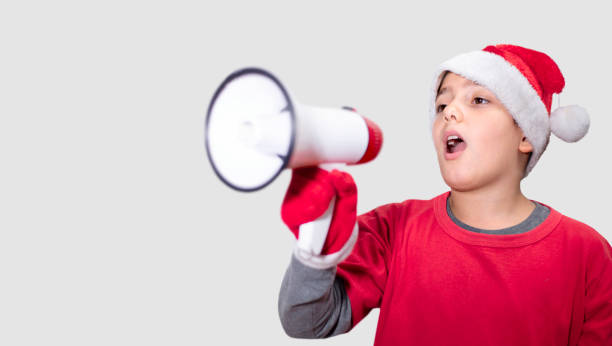 istock kid shouting to the megaphone 1443520943
