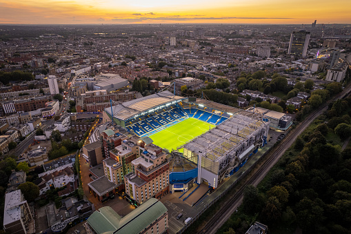 The home of Chelsea Football Club, Stamford Bridge sits in Chelsea in London. The stadium is seen from an aerial view showing the stand and pitch